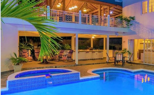 Overhead view of Mais Oui Villa in Discovery Bay Jamaica with multipurpose court for tennis basket ball and pickleball in Jamaica