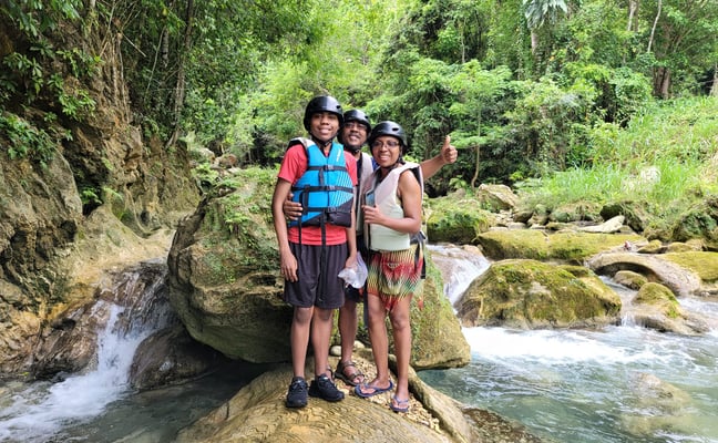 Family at River rafting at River Rapids in Jamaica near Mais Oui Villa in Jamaica